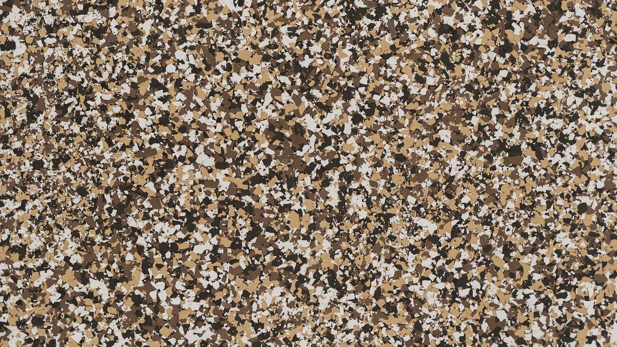 Flake flooring sample with decorative broadcast chips