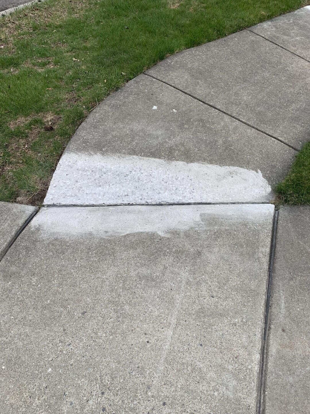 Sidewalk concrete repair with grass border