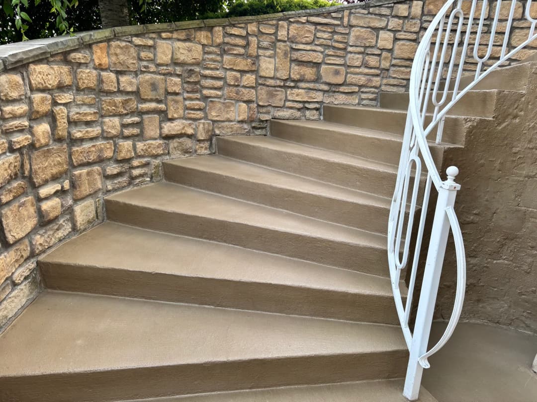 Wide view of concrete stair overlay and front entry resurfacing in Western New York