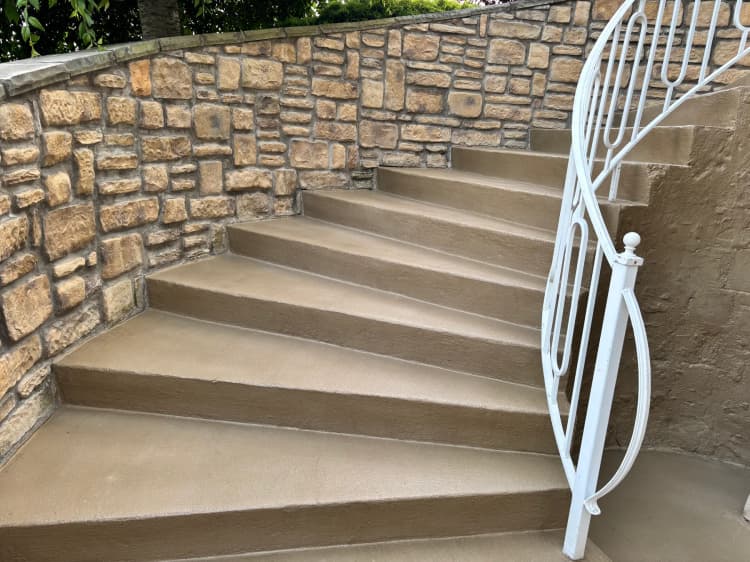 Wide view of concrete stair overlay and front entry resurfacing in Western New York