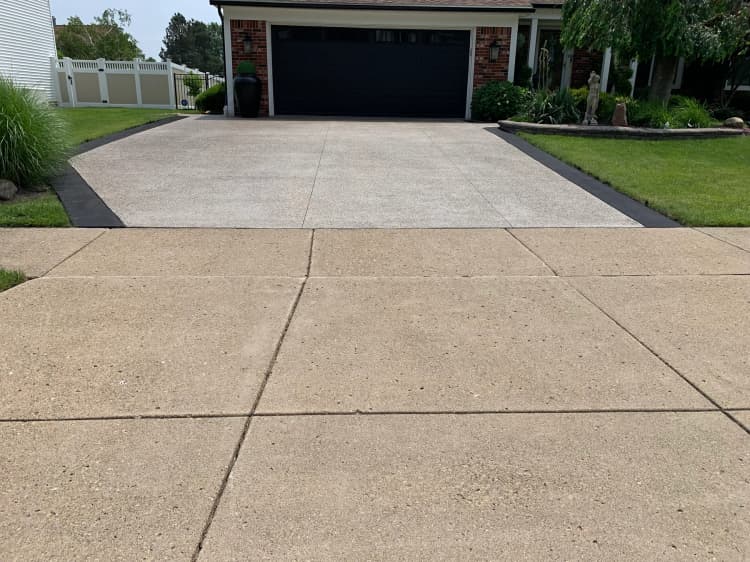 Close view of repaired and resurfaced residential concrete driveway near Buffalo NY
