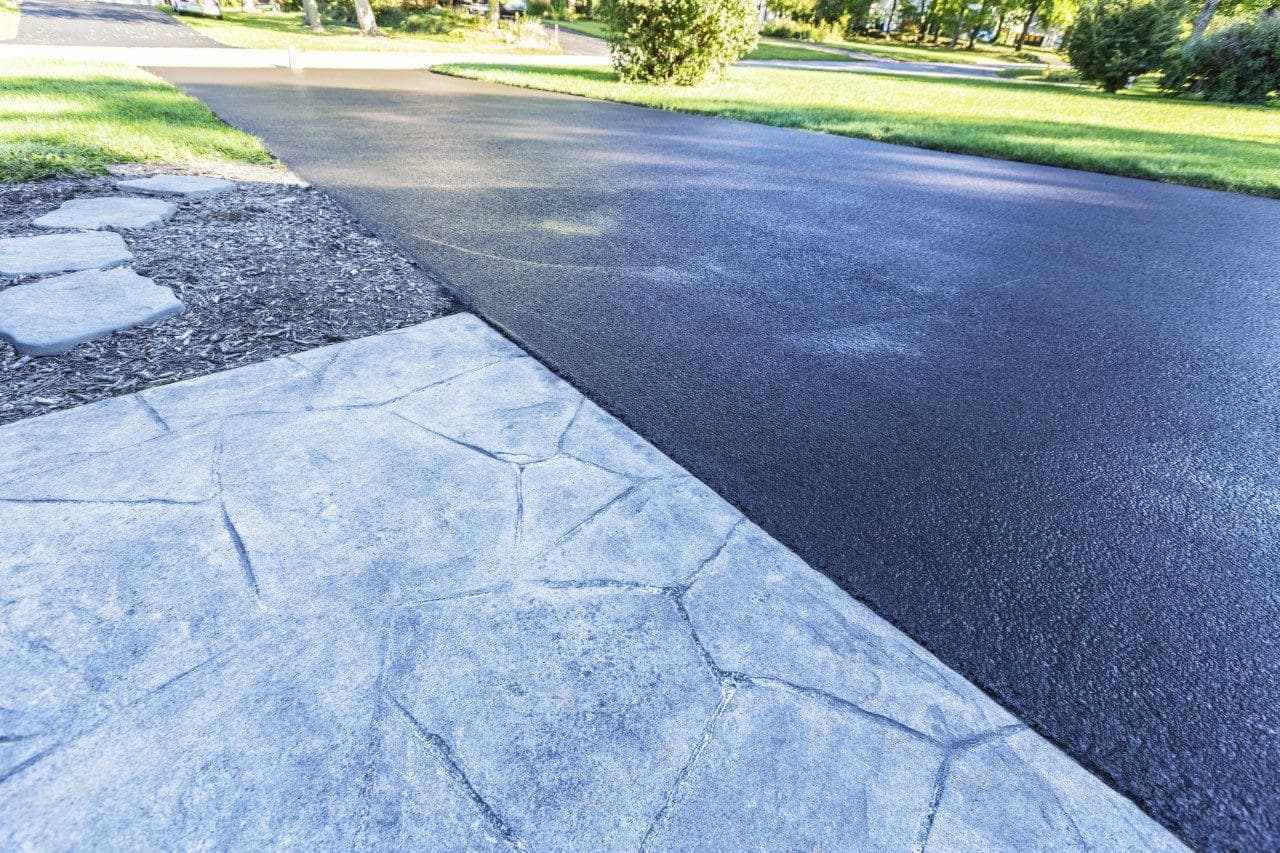 Close up of a sidewalk and driveway surface